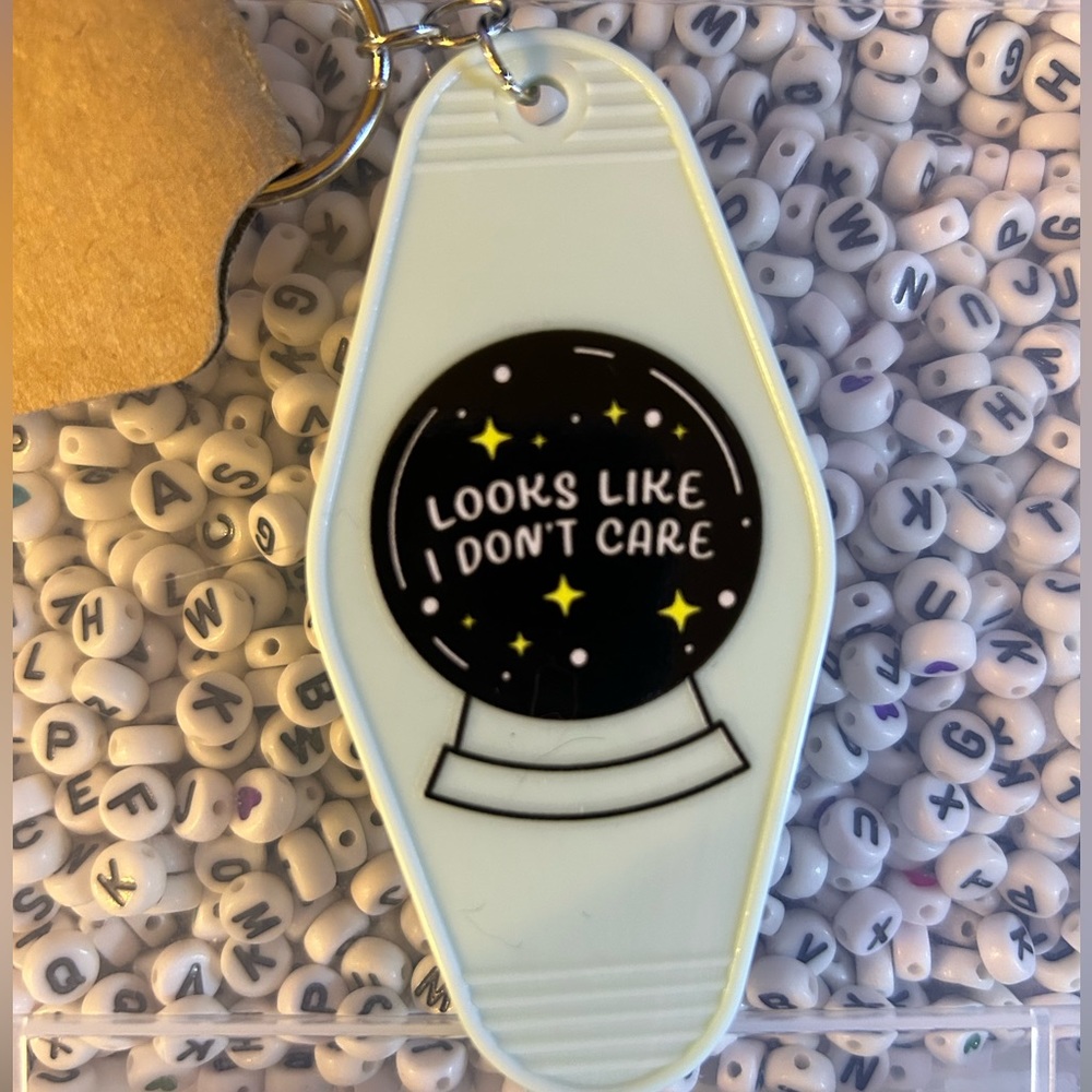 Looks like I don’t care 🔮 Crystal ball keychain - light blue